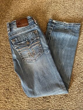 Rock Revival Men's Light Blue Ryker Bootcut Jeans with Embroidered Back Pockets